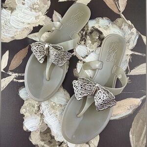 Salvador Ferragamo Bali Lace Bow Jelly Flats in Silver Grey Size 8.